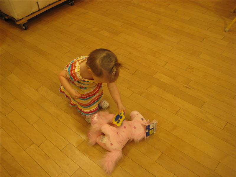 Jess_Build-A-Bear_Unicorn-3.JPG - Not sure he's getting all that clean on the floor but I'm trying anyway!?...