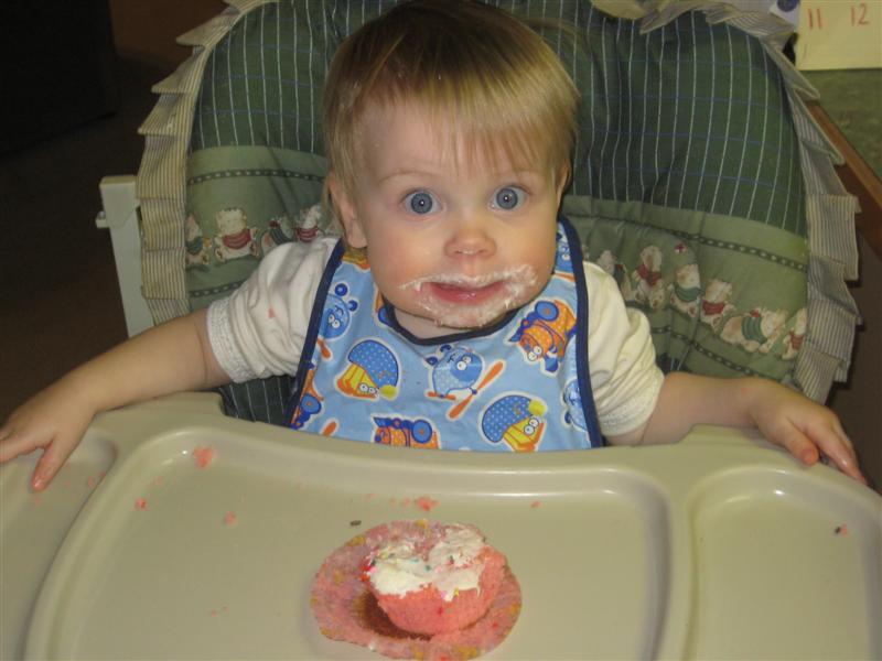 Jess_CupcakeAttack-2.JPG - I look like a boy in this picture?... Apparently, a boy who LOVES cupcakes that is!?...